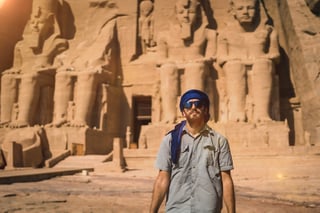A Young Tourist With A Blue Turban Visiting The Abu Simbel Temple