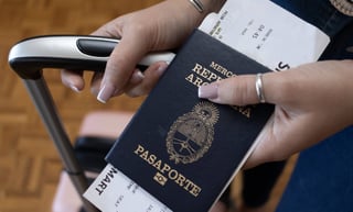 Young Girl Showing The Argentine Passport With Her Travel Bags Translation Passport Means