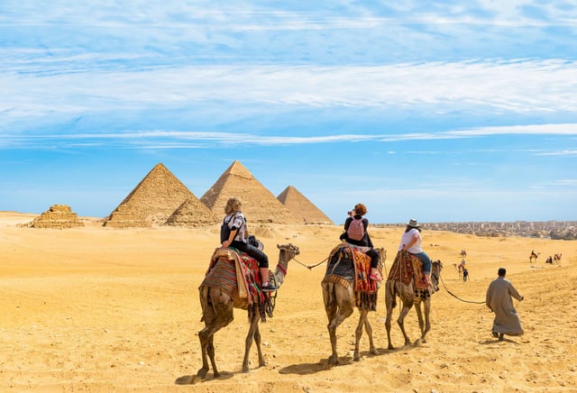 Camel Riding Near The Great Pyramids In Giza