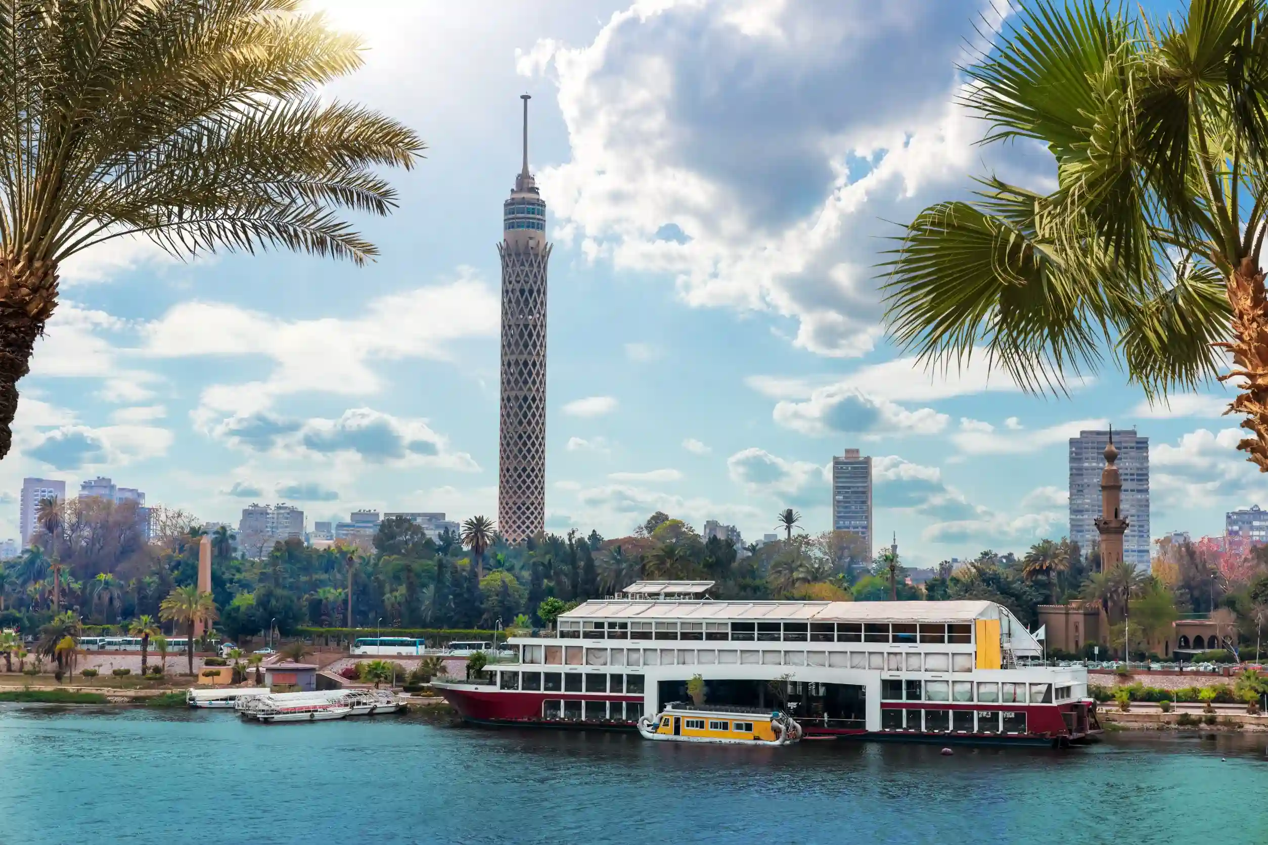 nile in cairo with ships and view on the tv tower egypt